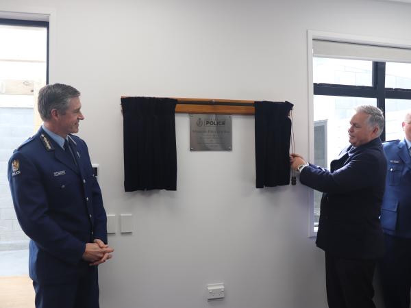 Commissioner Coster and Minister Mitchell unveiling the base's plaque.