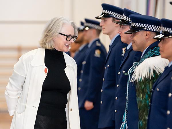 Patron Dame Miranda Harcourt and a wing member enjoy a moment on inspection.