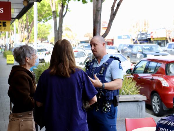 Senior Constable Brent Smith chats with locals in Taradale.