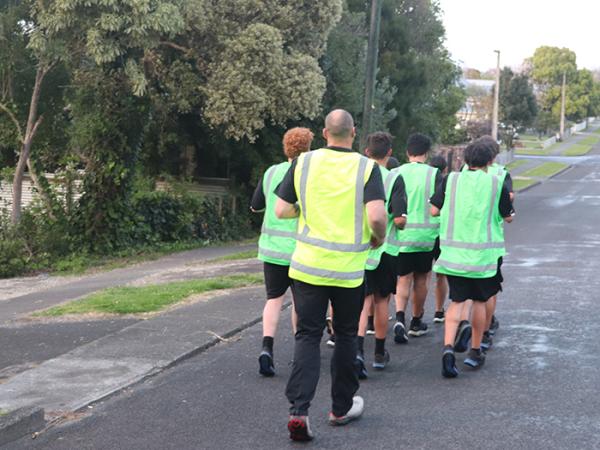 CACTUS participants running along a road.