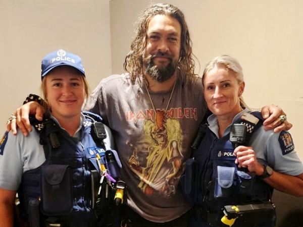 Actor Jason Momoa with Constables Roxy Worthington and Jen Hayward.