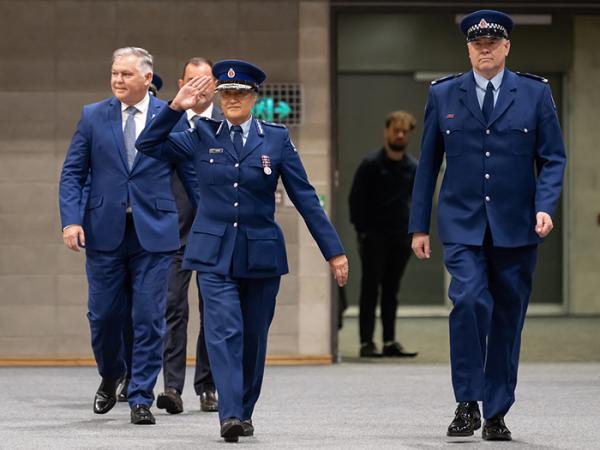 A salute for the parade as the interim Commissioner arrives for her only graduation in the role.