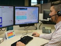 Communicator Andrew Wilson at work at Central Comms, with PCL running on his right-hand screen.