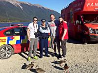 Constable Wayne Tilsley with some of the Lions faithful on the road. And some ducks.