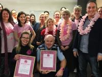 Senior Constable Bryan Ward, and entertainer Suzy Cato, receive their Pink Shirt awards.
