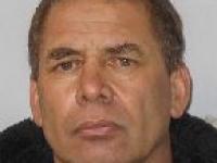 Shane Teddy has a warrant for his arrest. 