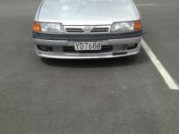 1994 silver Nissan Primera YD7680
