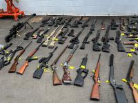 Thirty-five firearms were located during the search warrants 