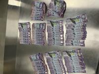 Money seized as a result of the three arrests. 