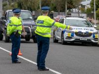 Officer stopping a car