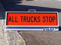 All trucks stop sign