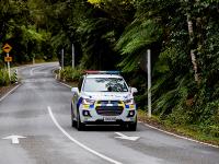 Car on rural road - Day