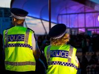 Policing at a concert venue, dusk