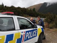 Rural near bush 2 x officers - Day