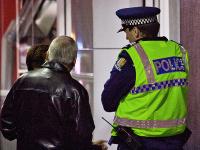 Sergeant speaking to couple