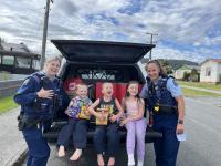 Sergeant Jayne Bretherton and Constable Jess Van't Hul delivering treats and care packages during the Easter Egg Drive.
