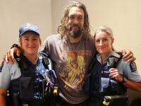 Actor Jason Momoa with Constables Roxy Worthington and Jen Hayward.