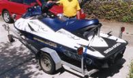2005 blue and white Seadoo, model GTX 4T