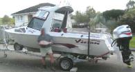 2005 silver/burgundy aluminium Vision boat - 2006 Mariner Optimax 115hp outboard