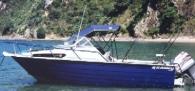 1997 blue and white Ramco 600 Fishmaster